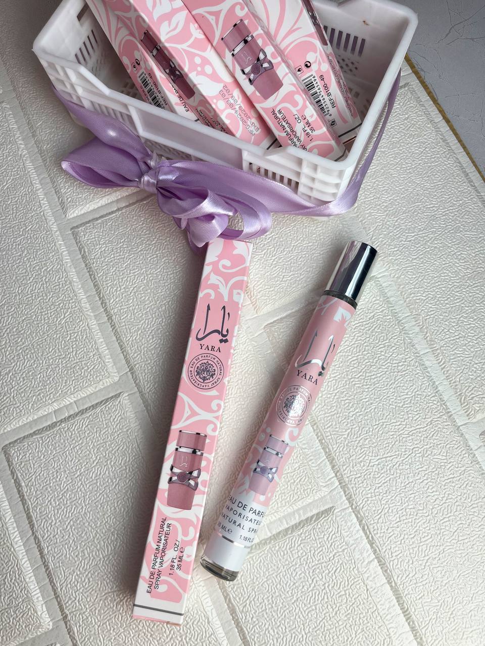 عطر قلمی زنانه رایحه یارا صورتی 30 میل